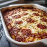 A freshly baked Pizza Cottage Cheese Bake with melted cheese and pepperoni.