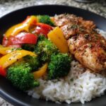 A healthy dinner recipe featuring grilled chicken, steamed broccoli and bell peppers over white rice. What Makes Perfect Dinner Recipes? Try This!