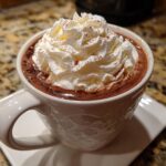 A mug of hot chocolate with whipped cream, perfect for One-Pan Starbucks Drinks (Minimal Cleanup).