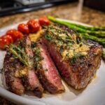Perfectly cooked steak with tomatoes and asparagus, a delicious example of 5-Ingredient Dinner Ideas.