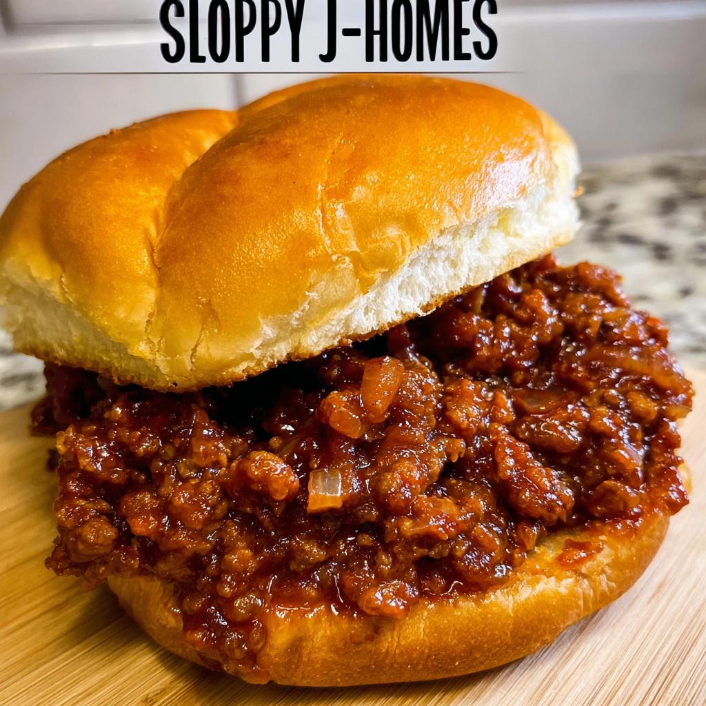 A close-up of a delicious, saucy Sloppy Joes sandwich piled high on a toasted bun.